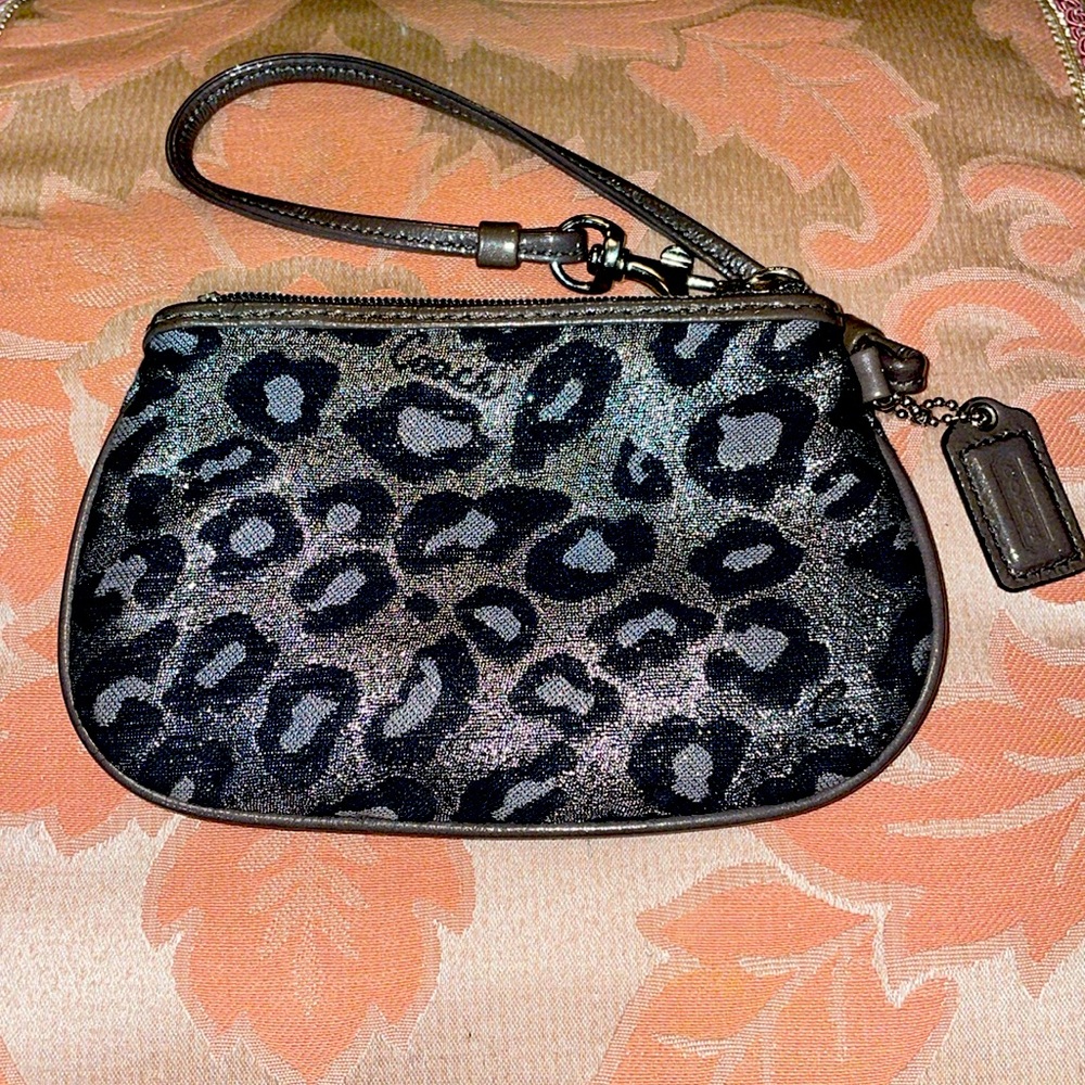 Coach Ocelot wristlet. EUC